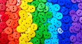 Colors of rainbow. Pattern of multicolored buttons texture background