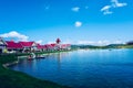 The colors of the water and the sky complement each other, and a row of villas are dotted among them