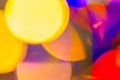 Colors yellow, red, purple, blue, green on a pink abstract blurred festive background Royalty Free Stock Photo
