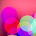 Colors yellow, red, purple, blue, green on a pink abstract blurred festive background Royalty Free Stock Photo