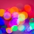 Colors yellow, red, purple, blue, green on a pink abstract blurred festive background Royalty Free Stock Photo