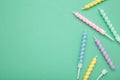 Coloruful birthday candles on mint background. Birthday celebration Royalty Free Stock Photo