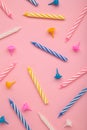 Coloruful birthday candles on pink background. Birthday celebration. Vertical photo Royalty Free Stock Photo