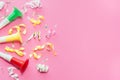 Colorul party streamers on pink background. Celebration concept. Flat lay Royalty Free Stock Photo