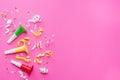 Colorul party streamers on pink background. Celebration concept. Flat lay Royalty Free Stock Photo