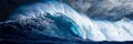 Colossal ocean wave against clear blue sky in side view, showcasing nature s power and beauty. Royalty Free Stock Photo