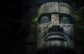 Colossal Olmec Head stone statue. Enormous Stone Head Sculpture: Reproduction of Olmec Civilization Royalty Free Stock Photo