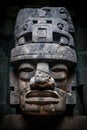 Colossal Olmec Head stone statue. Stone statue. Ancient monument. Intricate caving. Royalty Free Stock Photo