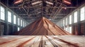 A colossal pile of sand sits in a warehouse used for mining and processing potash fertilizers, representing a world of mineral