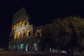 Colosseum - amphitheater, an architectural monument of Ancient Rome. View of the Colosseum in the evening.