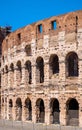 Colosseum ancient theater known as Flavian Amphitheatre aside Palatine Hill and Roman Forum Romanum in Rome in Italy Royalty Free Stock Photo