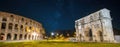 Colosseum and Arch of Constantine at night in Rome, Italy Royalty Free Stock Photo