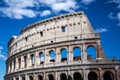 Colosseum with clear blue sky and clouds, Rome