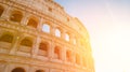 Colosseum or Coliseum ancient ruins background blue sky Rome, Italy, stone arches and sunset Royalty Free Stock Photo