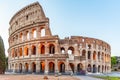 Colosseum, or Coliseum. Illuminated huge Roman amphitheatre early in the morning, Rome, Italy Royalty Free Stock Photo