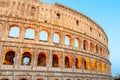Colosseum, or Coliseum. Illuminated huge Roman amphitheatre early in the morning, Rome, Italy Royalty Free Stock Photo