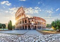 The Colosseum in the morning sun rays, beautiful morning view of Rome, Italy Royalty Free Stock Photo