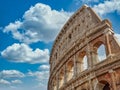 Colosseum Rome Italy blue clouds sky Royalty Free Stock Photo