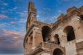 Colosseum, Rome, Italy under cloudy sky with visitors. Royalty Free Stock Photo