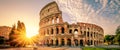 Colosseum in Rome and morning sun, Italy