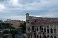 Colosseum seen from the Roman forum on a cloudy day