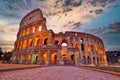 Colosseum at sunset, Rome. Rome best known architecture and landmark. Rome Colosseum is one of the main attractions of Rome and Royalty Free Stock Photo