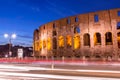Colosseum at twilight with light trails in Rome, Italy