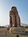 Colossi of Memnon, at the Valley of Kings in Luxor, Egypt. Royalty Free Stock Photo