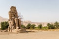 Ancient statues of Colossi on the west bank of the Nile, Luxor, Egypt Royalty Free Stock Photo