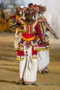 A coloufully dressed performer at the Kataragama Festival in Sri Lanka.