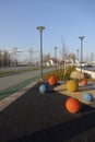 Colour balls on ground by the pedestrian walkway on Reidi promenade (Reidi tee in Estonian). Sea on the right, green