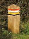 Colour Coded Wooden Post on the South West Coast Path, UK