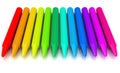 Colour crayons over white background