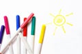 Colour felt-tip pens and sun Royalty Free Stock Photo