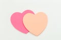 Colour paper heart stick note on a white background