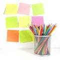 Colour pencils in the basket and post it Royalty Free Stock Photo