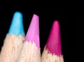 Colour pencils blue, pink, purple close up macro Royalty Free Stock Photo