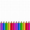 Colour pencils border on copy-book paper.