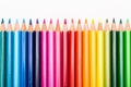 Colour pencils lined up in row Royalty Free Stock Photo
