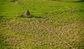 Colour picture of haystacks on a hill in a village Royalty Free Stock Photo