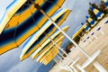 Colour sunshades on a empty beach