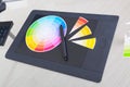 Colour wheel and graphic tablet Royalty Free Stock Photo