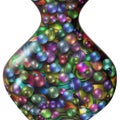 Coloured balls in glass vase