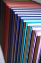 Coloured books in neat row Royalty Free Stock Photo