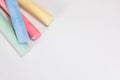 Coloured chalk sticks closeup with copy space Royalty Free Stock Photo