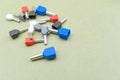 Coloured crimp terminals for different wire sizes. Copper sleeves for crimping electrical cables. Ferrules. Selective