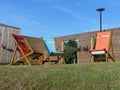Coloured deck chairs at The Hive at Croxley Park, Watford
