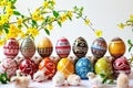 A set of colourful hand-painted Easter eggs presented on a white background. Royalty Free Stock Photo