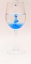 Coloured Food Dye in Wine Glasses Royalty Free Stock Photo