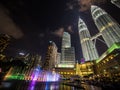 Coloured Fountains in front of the Petronas Towers and Suria KLCC Mall Royalty Free Stock Photo